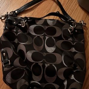 Signature Coach black and silver metallic shoulder bag.